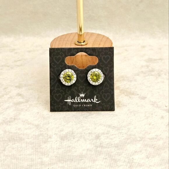 Hallmark Jewelry - Hallmark stud earrings in Peridot color and stainless steel.